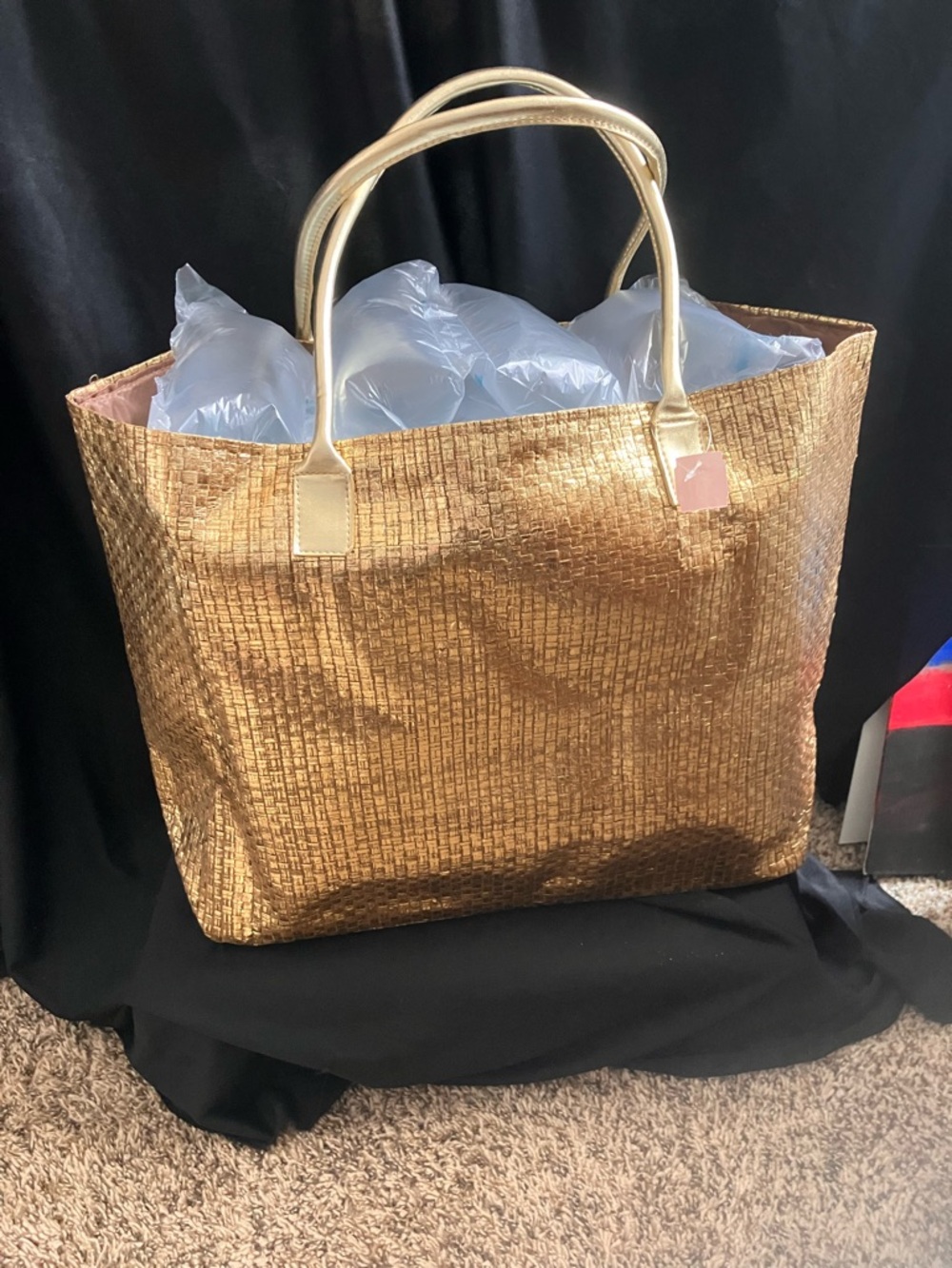 Metallic Gold tote woven texture with zipper pocket.